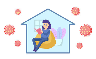 woman sit at bean bag reading a book at home. stay at home to prevent self from coronavirus (covid-19) outbreak. self quarantine