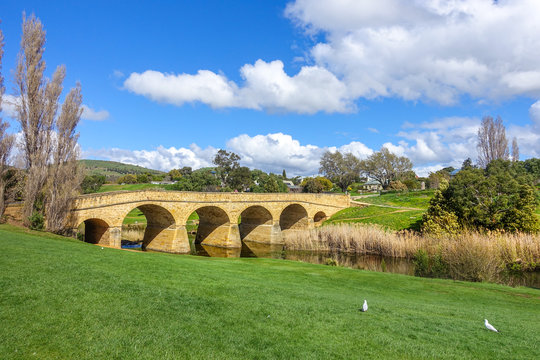 The beautiful view near Richmond Bridge with village houses in distance. It is a heritage-listed arch bridge and a popular tourist attraction in Tasmania, Australia