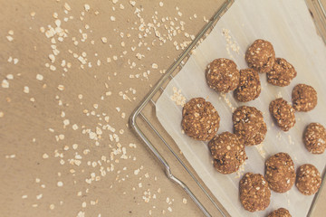 Topview homemade oat cookies over baking tray