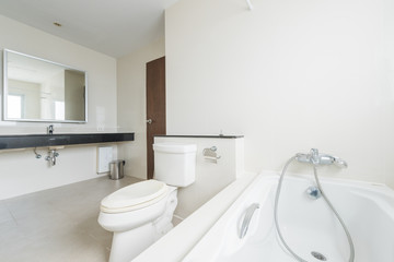 Fototapeta na wymiar White toilet clean and simple bathroom
