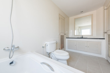 Obraz na płótnie Canvas White toilet clean and simple bathroom