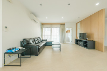 Fototapeta na wymiar Modern living room and kitchen in small apartment 