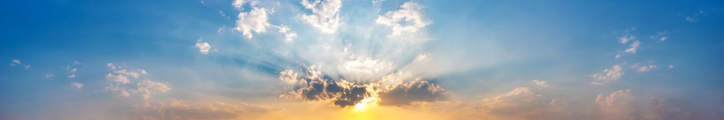 Panorama of Dramatic vibrant color with beautiful cloud of sunrise and sunset. Panoramic image.