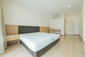 Modern interior design in small apartment with bedroom