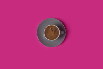 Black coffee on purple background