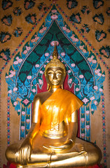 Golden statue of buddha inside the Ordination Hall at the Wat Arun temple, Bangkok, Thailand