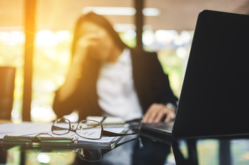 Businesswoman get stressed and headache while having a problem at work in office