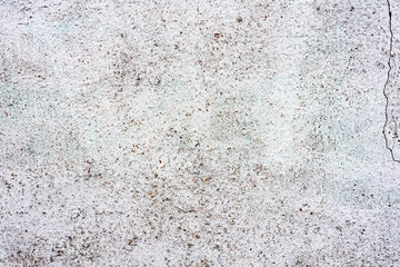 Obraz premium Texture of a concrete wall with cracks and scratches which can be used as a background