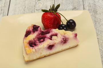 Cheesecake with cherry served strawberry