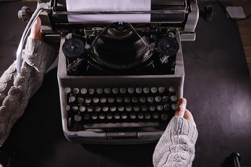 Vintage journalist tool. Typewriter retro. The writer is at work. Seal of the novel. Journalist writer concept.