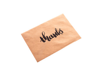 Brown color envelope with hand writing word 