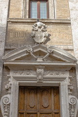 Obraz premium Rome, 10.11.2019, old porch and wooden entrance door