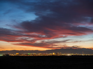 Sunset view of the beautiful strip skyline with red clouds