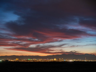 Sunset view of the beautiful strip skyline with red clouds
