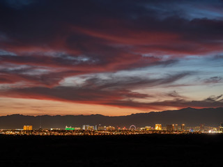 Fototapeta premium Sunset view of the beautiful strip skyline with red clouds