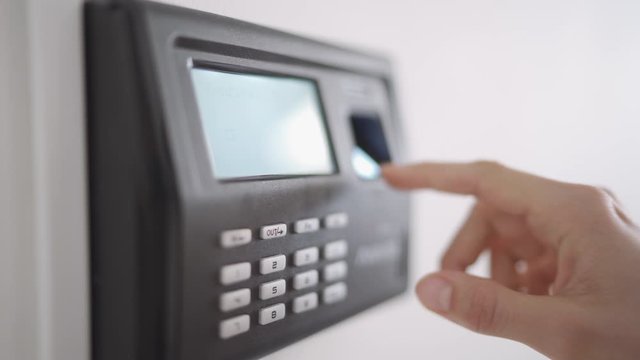 Closeup Woman Finger Using Biometric Fingerprint Attendance System Machine