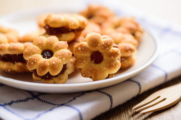 Cracker with pineapple jam (flower shape) on plate ready to eating, Thai snack