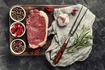 Beef steaks ready to cooking, culinary background