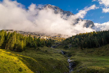 The spectacular Eiger North Face mountain peak, world famous for rock climbing in the alpine region of Kleine Scheidegg in Grindelwald, Switzerland. The Eiger is famous throughout history for climbing