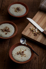 Phirni, a traditional and delicious indian style milk and rice based creamy dessert, served in clay pot