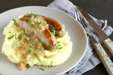 English sausages with mashed potatoes and gravy.