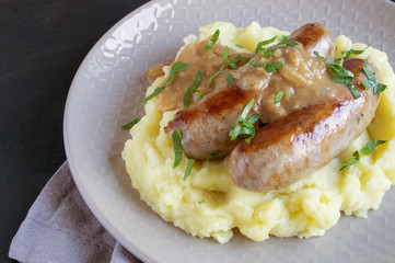 English sausages with mashed potatoes and gravy.