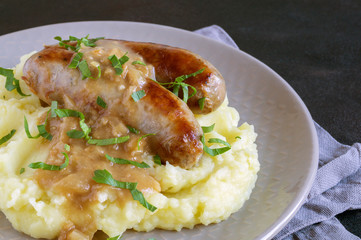 English sausages with mashed potatoes and gravy.