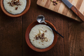 Phirni, a traditional and delicious indian style milk and rice based creamy dessert, served in clay pot