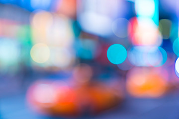  time square at nigh with colorful lighting, -blurred for background.
