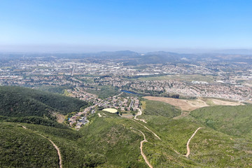 Fototapeta na wymiar Aerial view of Double Peak Park in San Marcos. 200 acre park featuring a play area and hiking trails that lead to a summit.