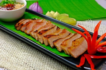 Charcoal-boiled pork neck, Grilled pork with Thai spicy sauce.