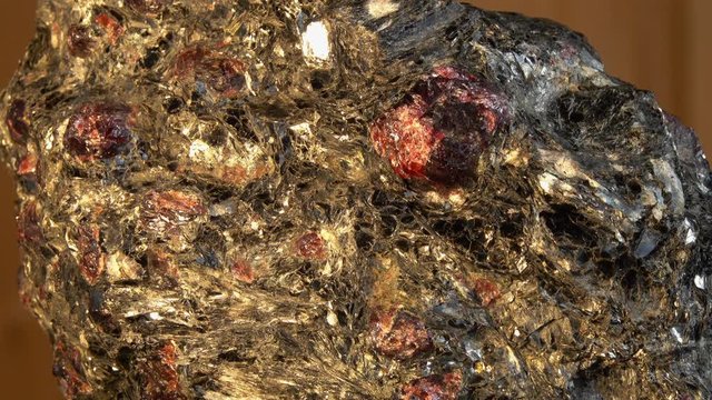 Garnet Mica-Schist sample. Almandine-garnets Crystals interspersed in a massive piece of shale rock