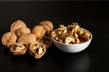 Handful of walnuts and walnuts fruits