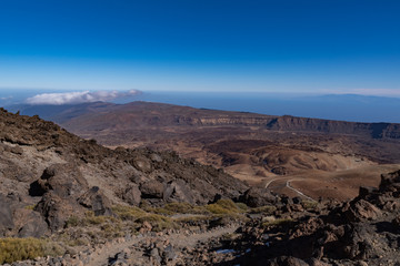 Fototapeta na wymiar View from Teide то Las Canadas Caldera volcano with solidified lava and Montana Blanca mount. Teide national Park, Tenerife, Canary Islands, Spain. Panorama