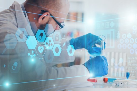 Man researcher carrying out scientific research in a lab