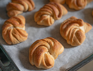 desserts, homemade croissants just pulled out of the oven still on parchment paper