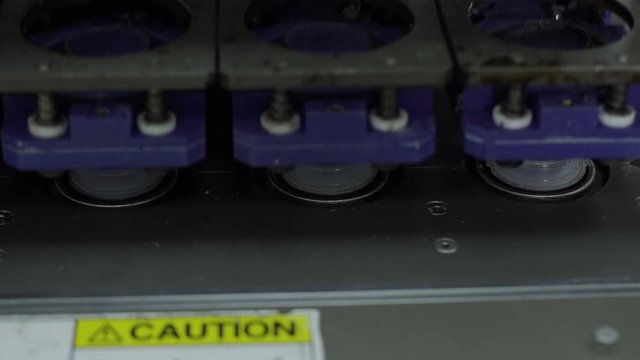 plastic bottles on Medical Solutions Conveyor . Blow fill seal technology technique used to produce liquid-filled container on medical or food industrial factory. close up medical industry