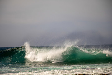 waves crashing on the beach