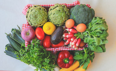 Fresh organic vegetables in basket,  eco friendly shop.