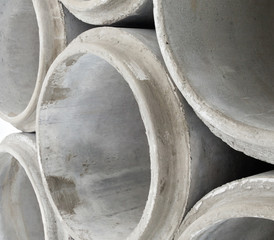 Stack of new concrete pipes.