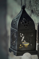 Candle lamp burns during the holy Muslim fasting Ramadan.