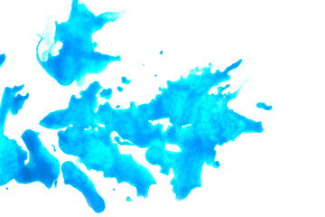 Watercolor splash of color on a sheet of paper