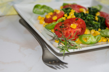 spinach, tomato and corn salad, healthy diet concept