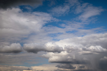 Fototapeta na wymiar Blue sky, Cumulus clouds, Sun, Spring