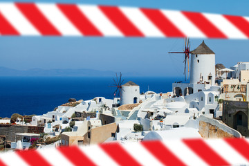 Santorini island landscape with warning tape. Closed historical european sightseeing, delayed...