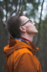 Fototapeta premium young man in the forest