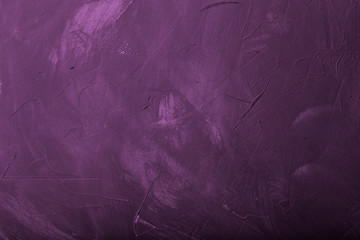 Textured plastered background with a variety of arbitrary stains. Toned