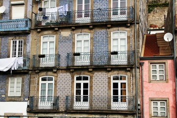 Old colorful tiled facades in Porto city