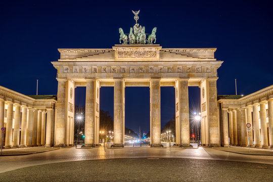 The famous illuminated Brandenburg Gate in Berlin at night