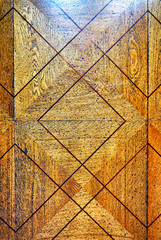 Antique old weathered wood floor parquet with diamond pattern as a background.